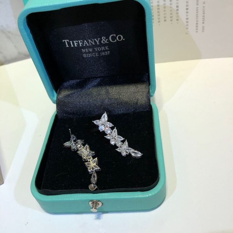 T*f*ny earrings